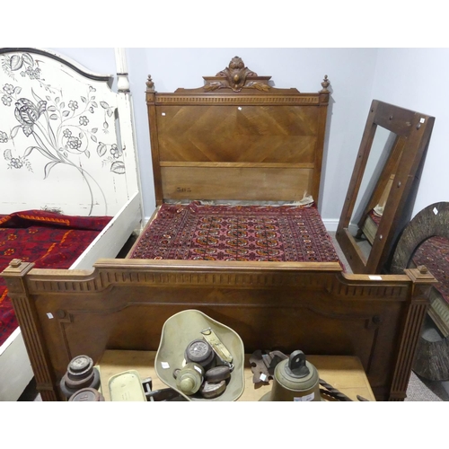 341 - An antique French carved walnut double Bedstead, the head and base boards with quarter-veneer detail... 