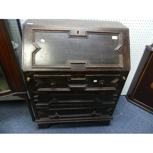 402 - An early 20thC oak Bureau, with fall front top above three long drawers, raised on bracket feet, 30i... 