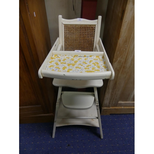 405 - A vintage white painted child's High Chair, with cane back, 20in (51cm) wide, 39in (99cm) high.