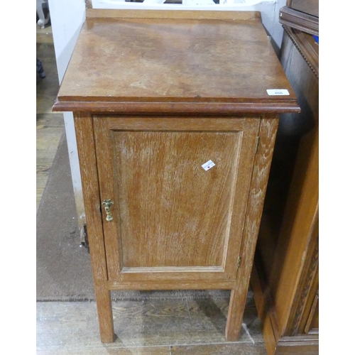 406 - An early 20thC oak Pot Cupboard, of  square form with single panelled door, 17in (43cm) wide, 31in (... 