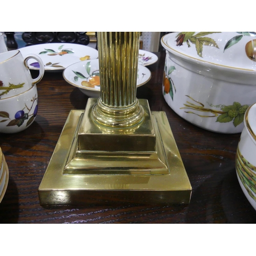 409 - An Edwardian brass Oil Lamp, of classical column form on stepped square base, with white glass shade... 