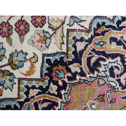 416 - Tribal Rugs: A Kashmiri silk rug, cream ground woven with black and pink traditional patterns, pile ... 