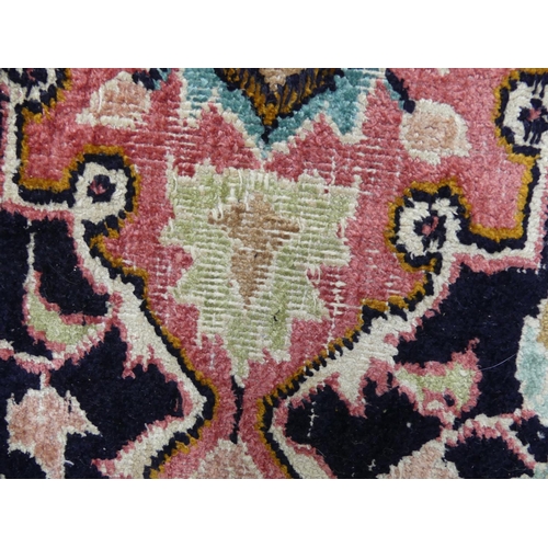 416 - Tribal Rugs: A Kashmiri silk rug, cream ground woven with black and pink traditional patterns, pile ... 