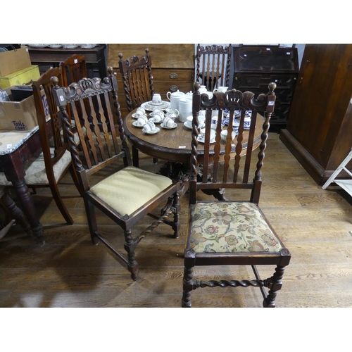 417 - A set of four oak Dining Chairs, with drop in seats (4)