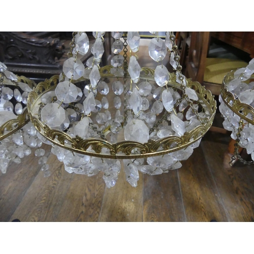 419 - A mid 20thC brass and crystal three-branch Chandelier, together with a three tier circular brass and... 