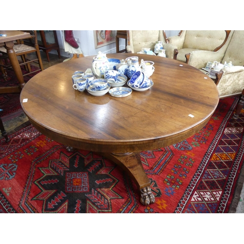 424 - An early 19th century rosewood Breakfast Table, the circular tilt top on a plain column and concave ... 