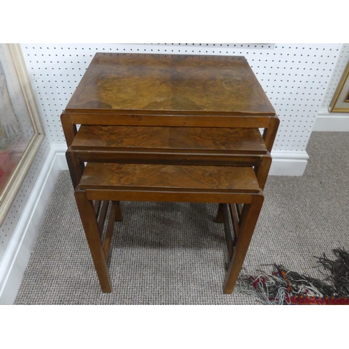 426 - A nest of three Art Deco figured walnut Coffee Tables, with rectangular tops on square legs joined b... 