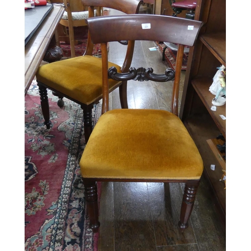 428 - A set of six Victorian mahogany Dining Chairs, each with yoke back and carved mid-rail, stuff-over s... 