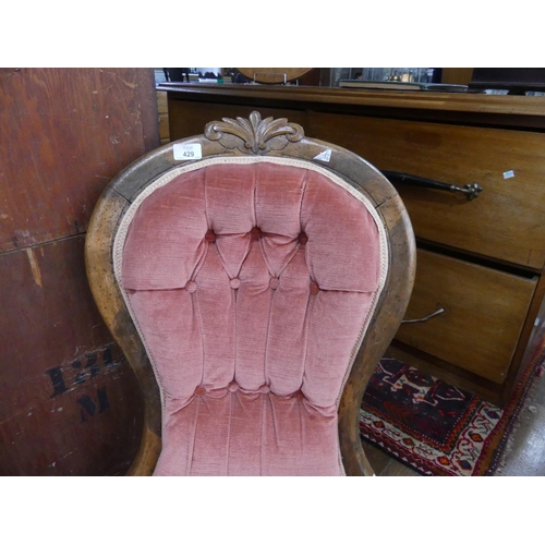 429 - A Victorian walnut balloon-back Nursing Chair, upholstered in pink button-back damask, together with... 