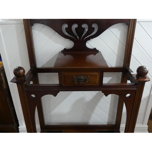 435 - An Edwardian Art Nouveau style mahogany Hallstand, by James Shoolbred & Co., of pierced and moulded ... 