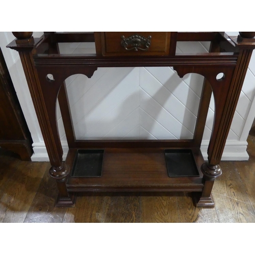 435 - An Edwardian Art Nouveau style mahogany Hallstand, by James Shoolbred & Co., of pierced and moulded ... 