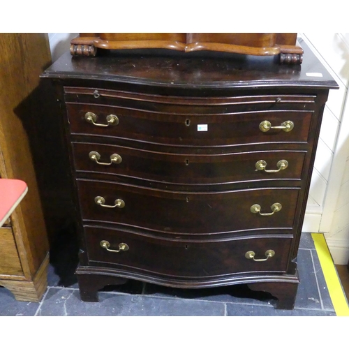 439 - A reproduction crossbanded mahogany Serpentine Chest of four drawers, with brushing slide, 28in (71c... 