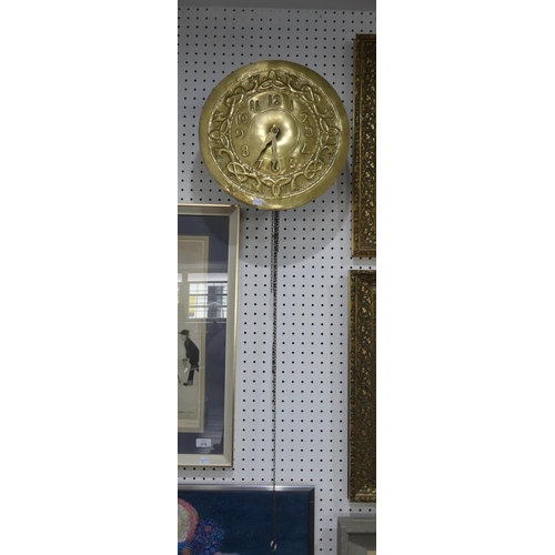 446 - An Arts and Crafts circular Brass Wall Clock, in the manner of Margaret Gilmour, Glasgow School, wit... 