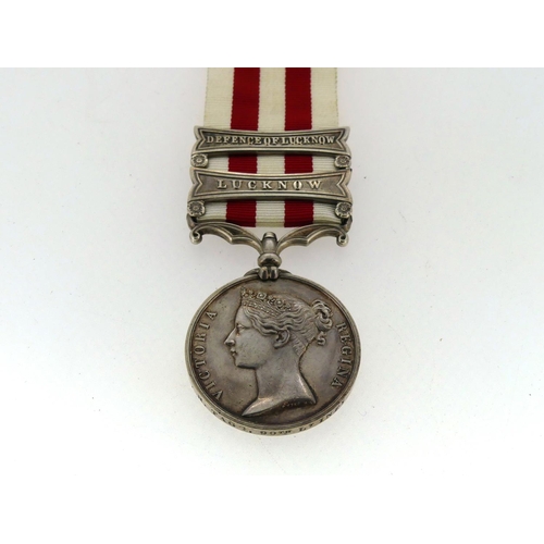 52 - Indian Mutiny Medal, 1858, named to R. Tagg. 90th. Lt. Infy., with two clasps, Defence of Lucknow an... 