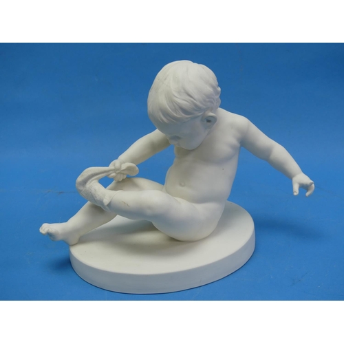 68 - A Gustafsberg parian porcelain figure of a Child, seated and pulling off a sock, impressed maker's m... 