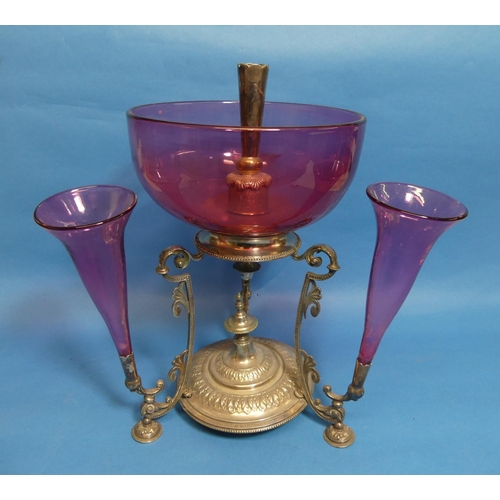 80 - An Edwardian cranberry glass and silver plated Epergne, with a central trumpet vase and bowl surroun... 