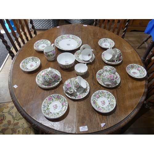 85 - A crown staffordshire Tea Service, reg. no 622733, with foliate border of pansies roses etc., compri... 