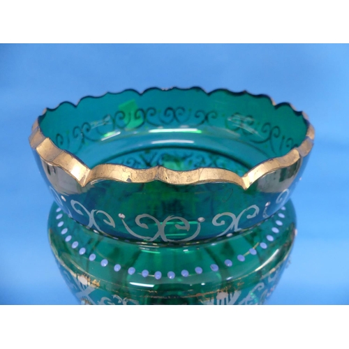 88 - A Victorian castle-topped green glass Lustre, painted in coloured enamels and gilt with floral decor... 