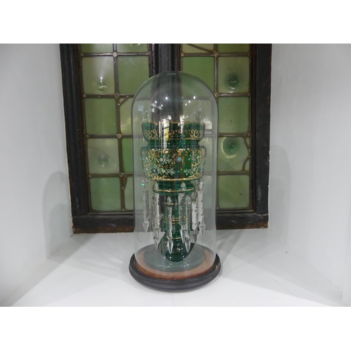 88 - A Victorian castle-topped green glass Lustre, painted in coloured enamels and gilt with floral decor... 