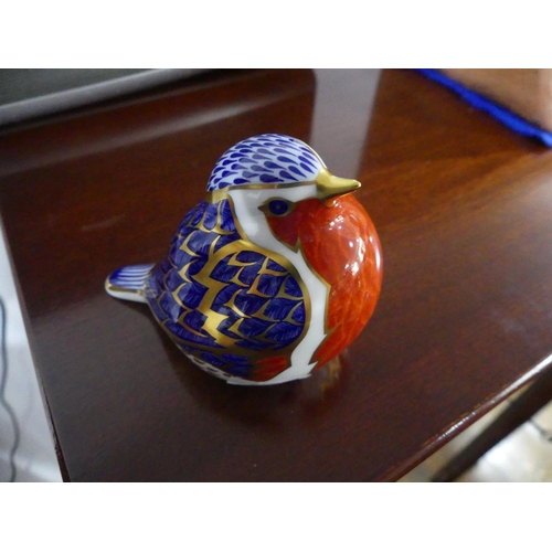 95 - A Royal Crown Derby robin Paperweight, decorated in the imari palette, with factory marks and silver... 
