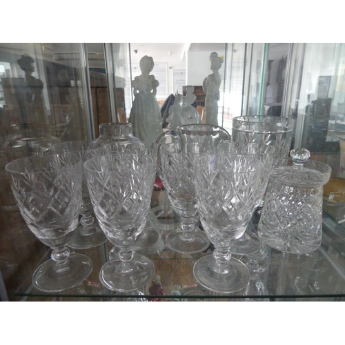 96 - A quantity of cut crystal Glassware, including six hock glasses, seven liqueur glasses, two decanter... 