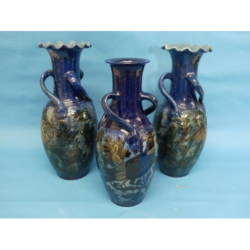 97 - A pair of Alexander Lauder (Barnstaple) pottery vases, of oviform form with raised neck and wavy rim... 