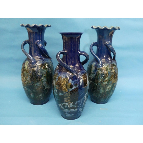 97 - A pair of Alexander Lauder (Barnstaple) pottery vases, of oviform form with raised neck and wavy rim... 