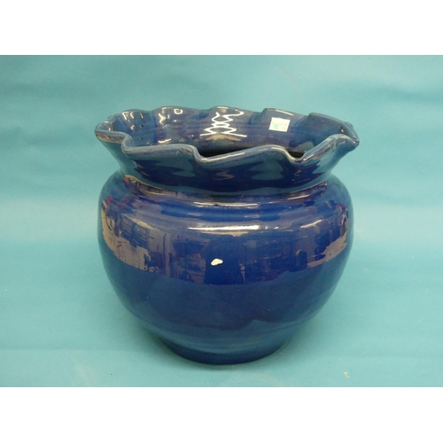 98 - A large C. H. Brannam (Barnstaple) pottery Jardiniere, ovoid with wavy rim,  the blue-ground body sg... 