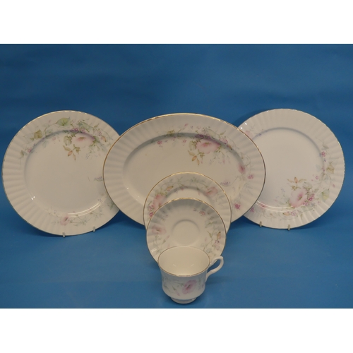 103 - A Royal Stafford bone china 116-piece Tea and Dinner service, with floral decoration, including two ... 