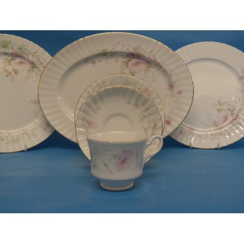 103 - A Royal Stafford bone china 116-piece Tea and Dinner service, with floral decoration, including two ... 