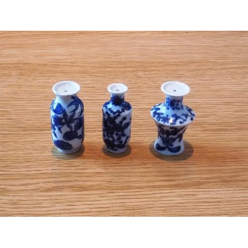 164 - Eight Chinese porcelain blue and white 'Doll's House' Miniature Vases, Qing dynasty, with floral dec... 