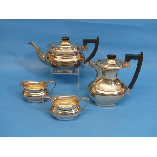 32 - An Elizabeth II silver four piece Tea Set, by Viner's Ltd., hallmarked Sheffield, 1964/5, of waisted... 