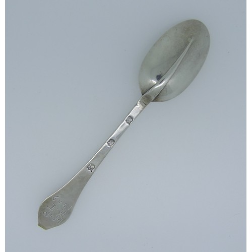 24 - A Queen Anne West Country silver dog nose Spoon, makers mark only on stem struck three times of IM c... 