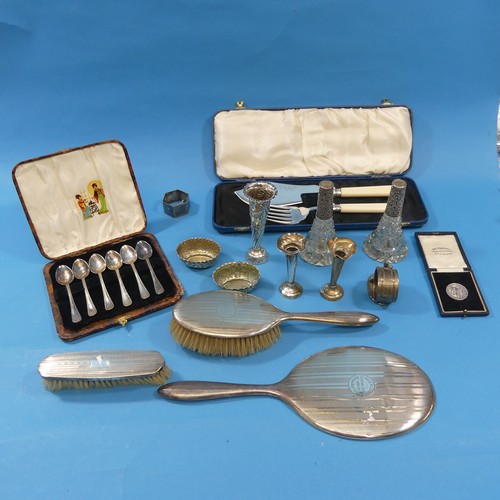 54 - A quantity of silver and silver plate, including hair brush and mirror, two scent bottles, no stoppe... 