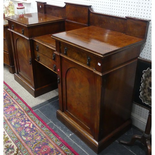 297 - An Edwardian mahogany breakfront Sideboard, with two central drawers flanked by further drawers and ... 