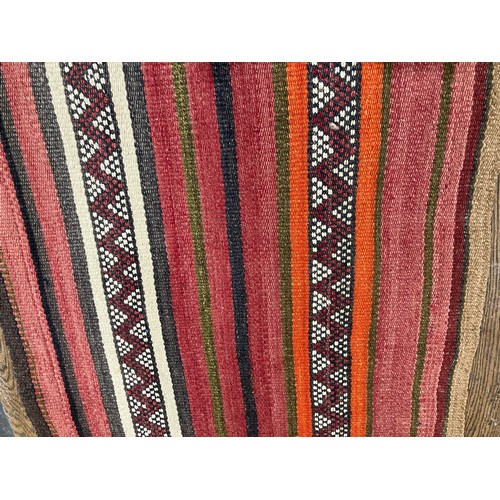 279 - Tribal Rugs: an old Kilim Runner, 100% wool, woven with stripes in subtle colours - plum, dusky red,... 