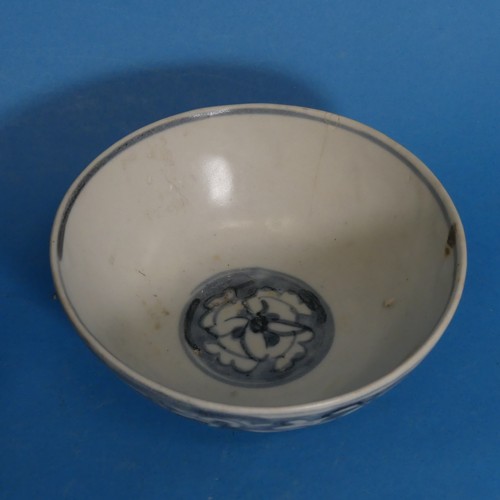 63 - A pair of antique Chinese Shipwreck Cargo Bowls, with blue and white decoration and central motif, o... 