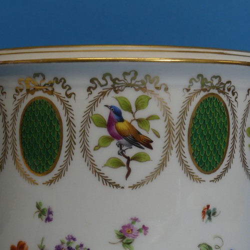 66 - A Dresden porcelain Jardiniere, the body decorated in floral sprays and alternation panels of flora ... 