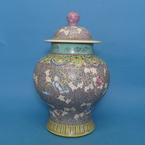 93 - A Chinese Republican period porcelain Temple Jar and Cover, decorated in enamels of purple, blues an... 