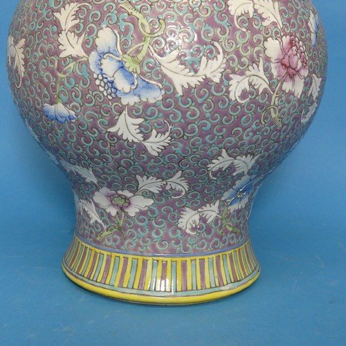 93 - A Chinese Republican period porcelain Temple Jar and Cover, decorated in enamels of purple, blues an... 