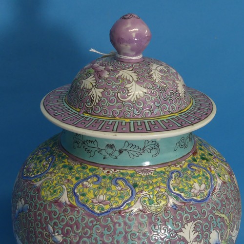 93 - A Chinese Republican period porcelain Temple Jar and Cover, decorated in enamels of purple, blues an... 