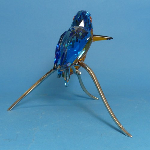 112 - A Swarovski Crystal Kingfisher Duo, the two cut glass birds, perched upon metal branch, impressed wi... 