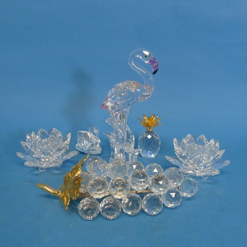 113 - A small quantity of Swarovski, to include Pineapple, Flamingo, Grapes, etc, all with etched mark, si... 