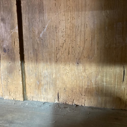 335 - A 19thC pine Housekeepers Cupboard, four cupboard doors enclosing shelves with three central drawers... 