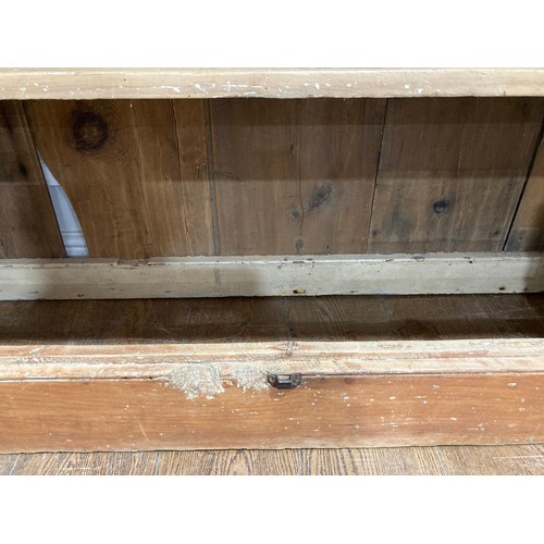 346 - An antique pine Cupboard, the plank doors opening to reveal a shelved interior, W 140cm x H 185cm x ... 