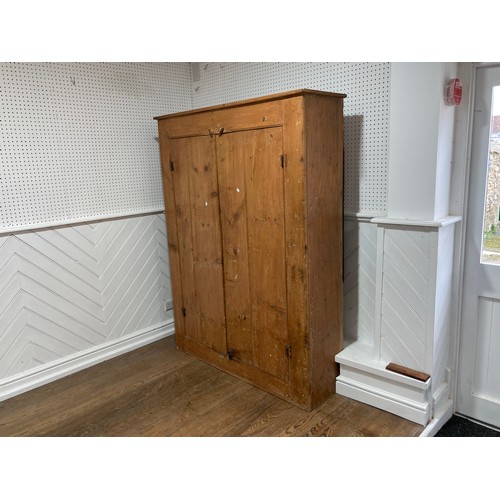 346 - An antique pine Cupboard, the plank doors opening to reveal a shelved interior, W 140cm x H 185cm x ... 