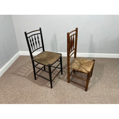 360 - Two Sussex-style chairs, each spindle back with rush seats, together with another Sussex-style arm c... 