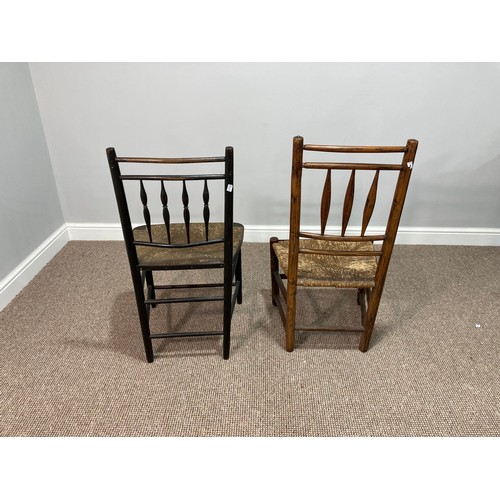 360 - Two Sussex-style chairs, each spindle back with rush seats, together with another Sussex-style arm c... 