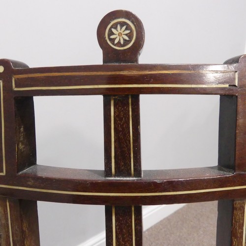 389 - An Edwardian mahogany framed two-seater Ladies Settee, the shaped top rail inlaid with classical urn... 