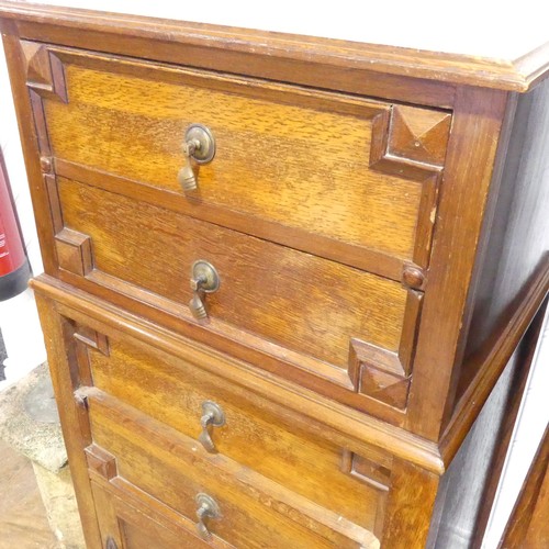 390 - Two early 20thC oak Tall Boys, of similar design, one with six drawers, W 53cm x H 126.5cm x D 46cm,... 